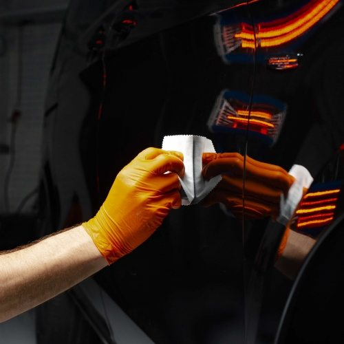 op_car-polish-wax-worker-hands-polishing-car-7XCEH6F-500x500